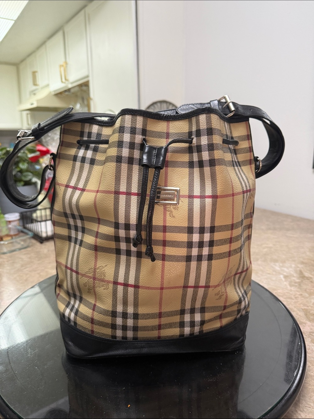 Vintage Burberry Bucket Bag features the Iconic Nova Check pattern.